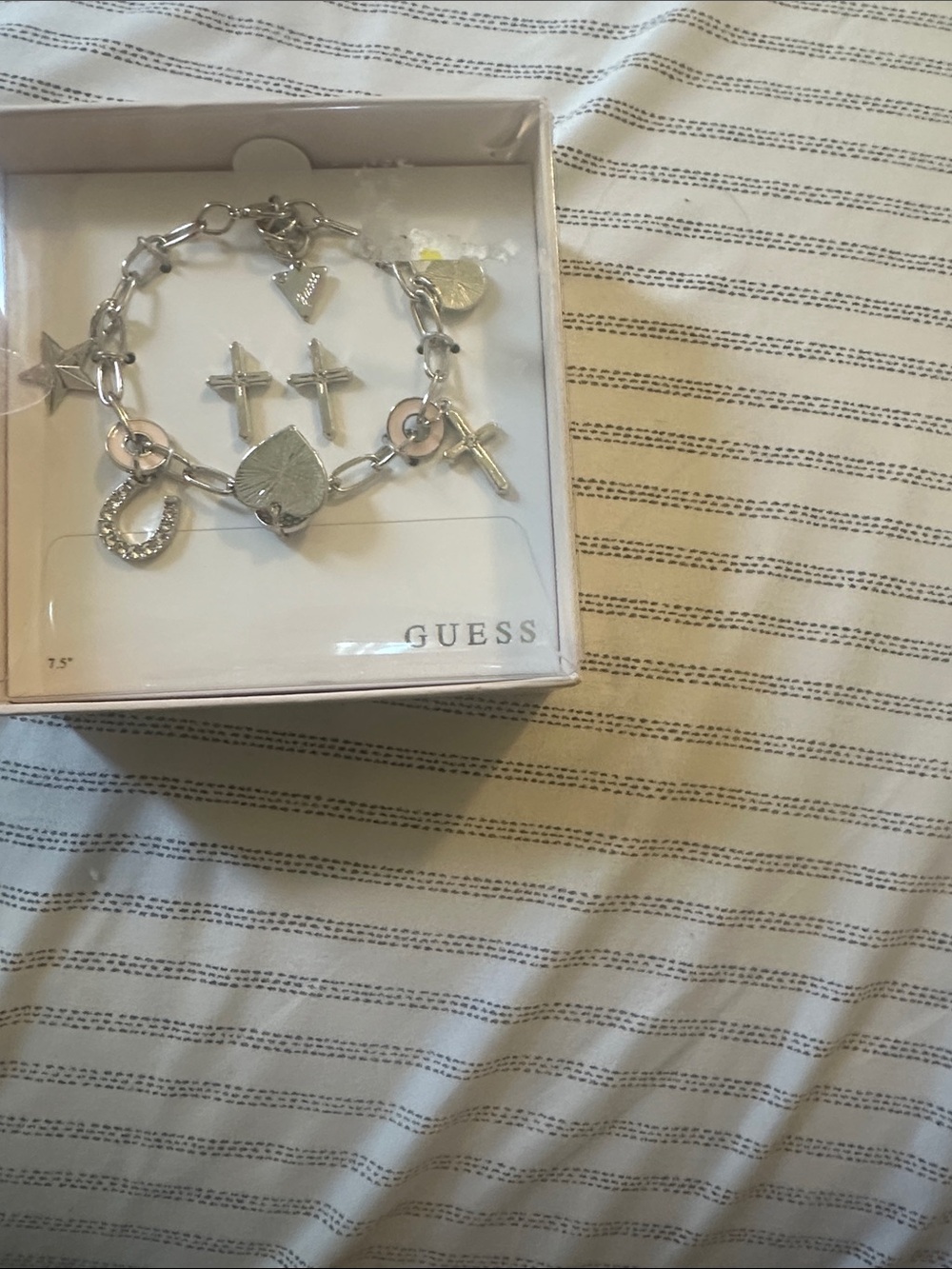 GUESS Silver-Tone Charm Bracelet with Heart, Cross & Horseshoe Charms